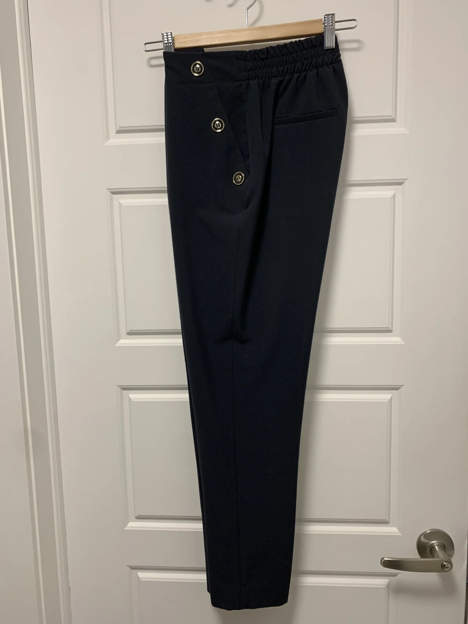 Featured image for Trousers with buttons