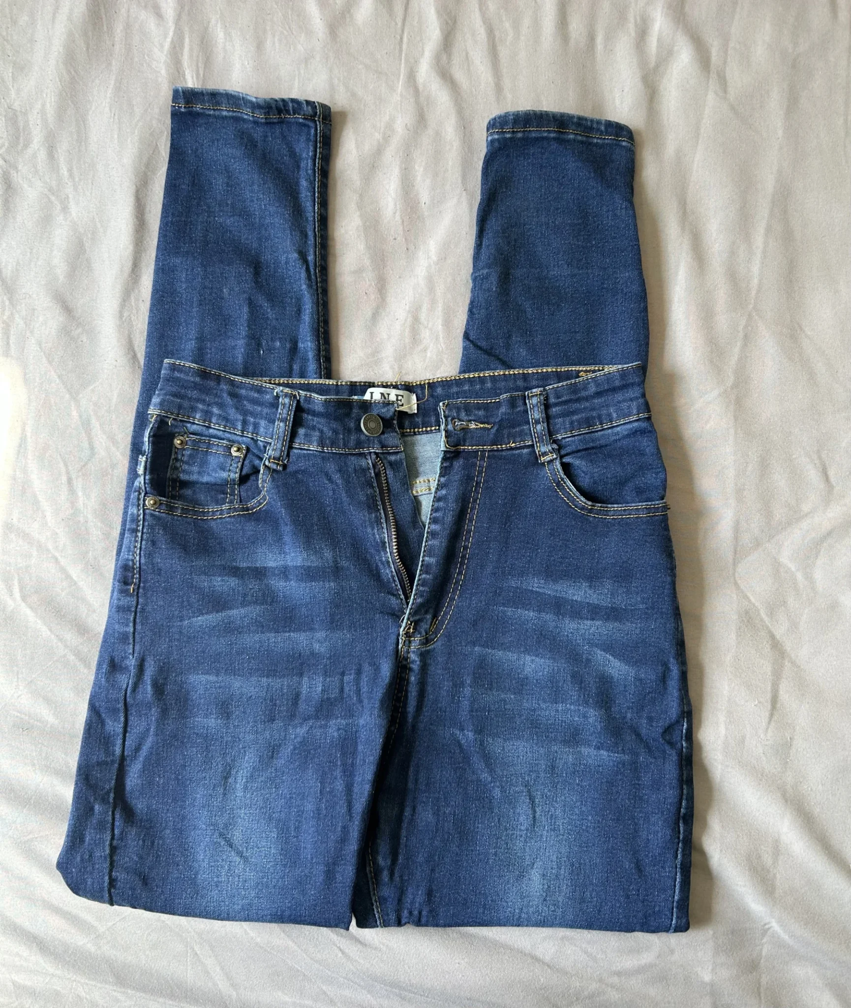 Featured image for Dark Blue High-Waisted Skinny Jeans – LINE brand – Size 9/10