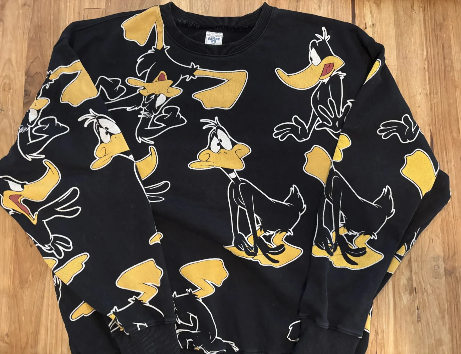 Featured image for AIME WO – All-over Daffy Duck sweatshirt – The Alternative Syndrome