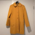 Featured thumbnail for Manteau col claudine COS jaune en coton