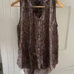 Featured thumbnail for Sleeveless blouse