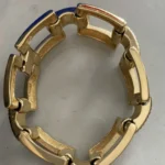 Thumbnail for Gold-tone bracelet and clip-on earrings set