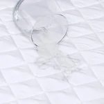 Thumbnail for Cot mattress protector