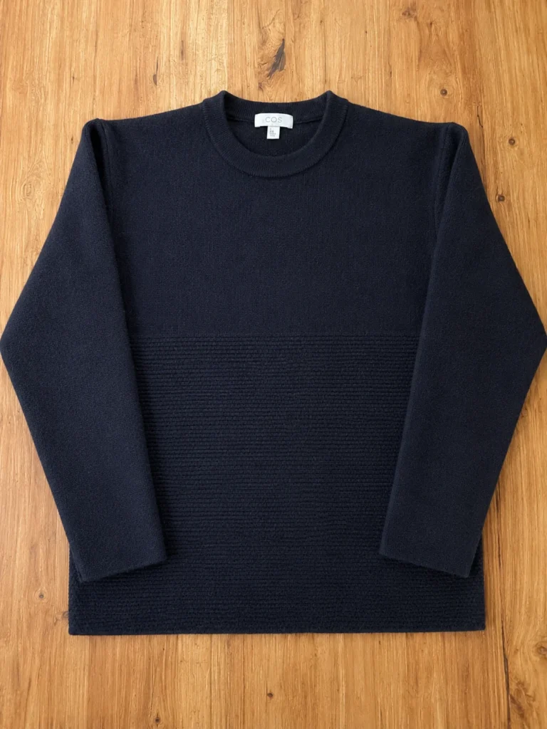 Featured image for Cos –  navy blue 100% wool jumper.
