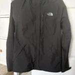 Featured thumbnail for The North Face black raincoat