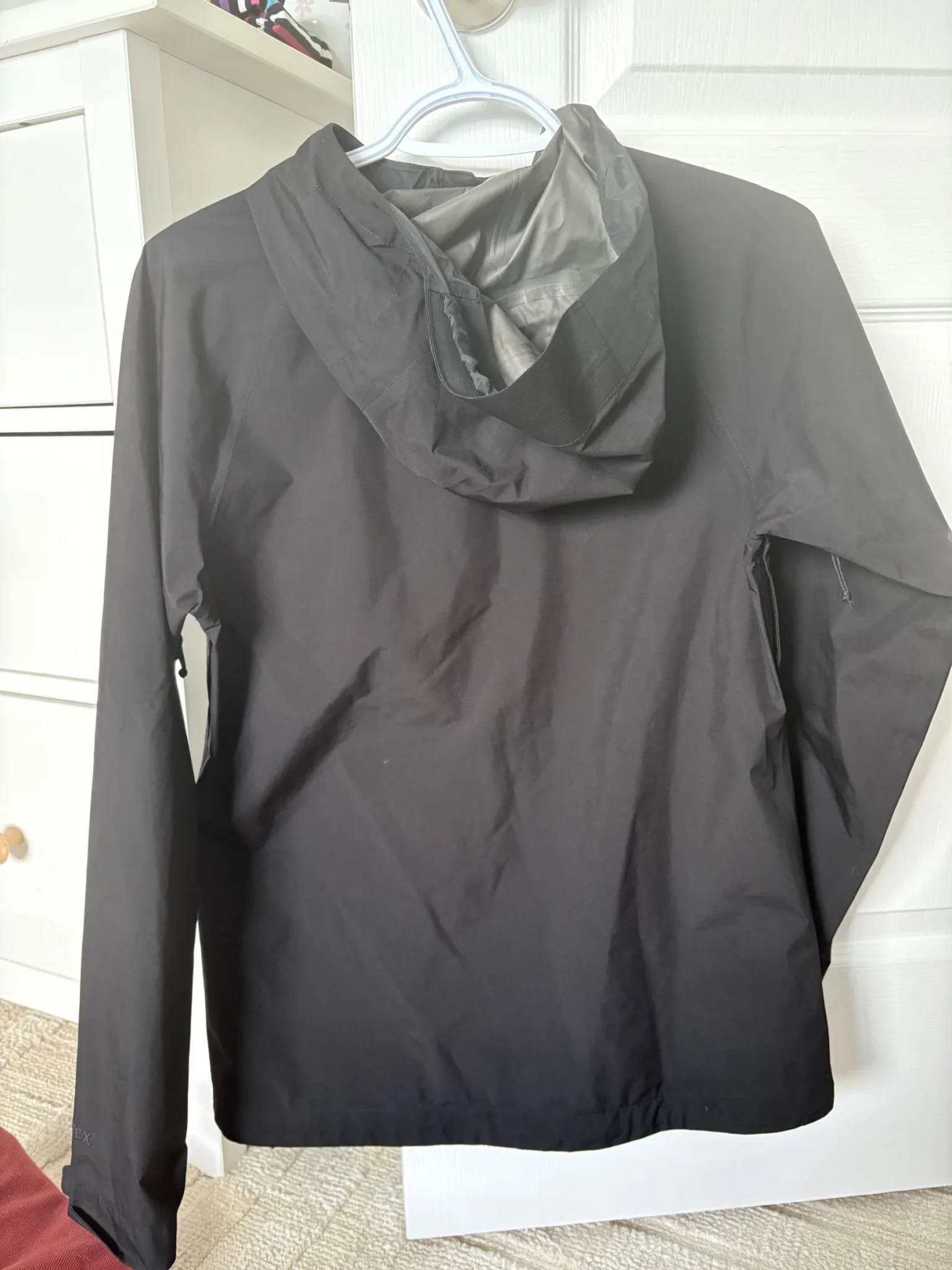 Image for The North Face black raincoat