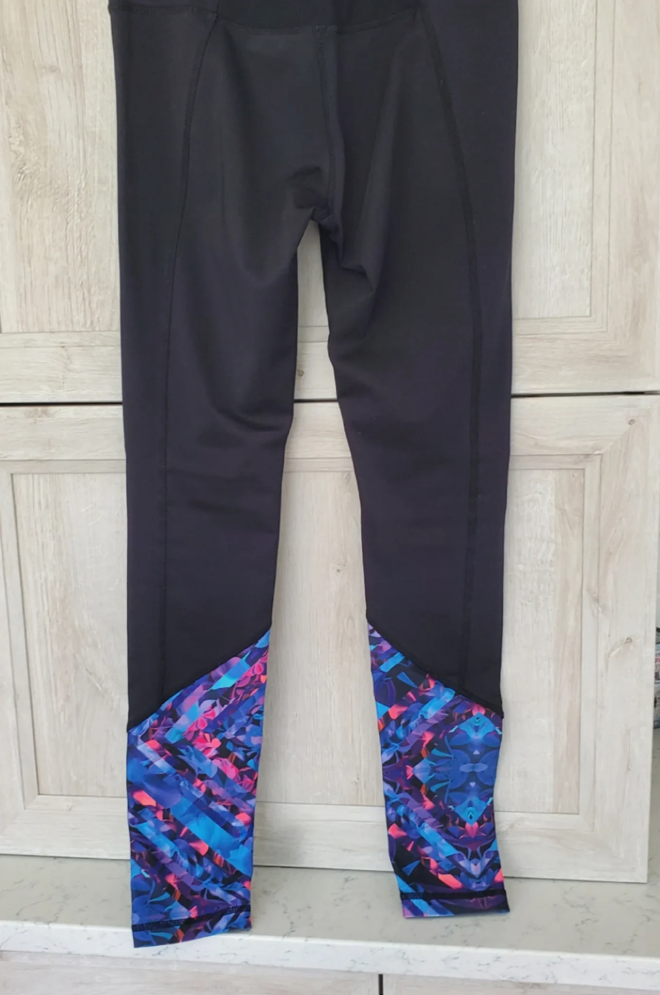 Featured image for Black leggings with a floral pattern at the bottom