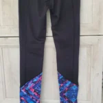 Featured thumbnail for Black leggings with a floral pattern at the bottom