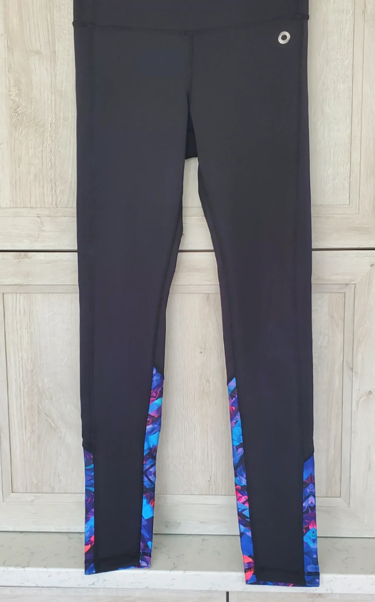 Image for Black leggings with a floral pattern at the bottom