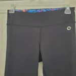 Thumbnail for Black leggings with a floral pattern at the bottom