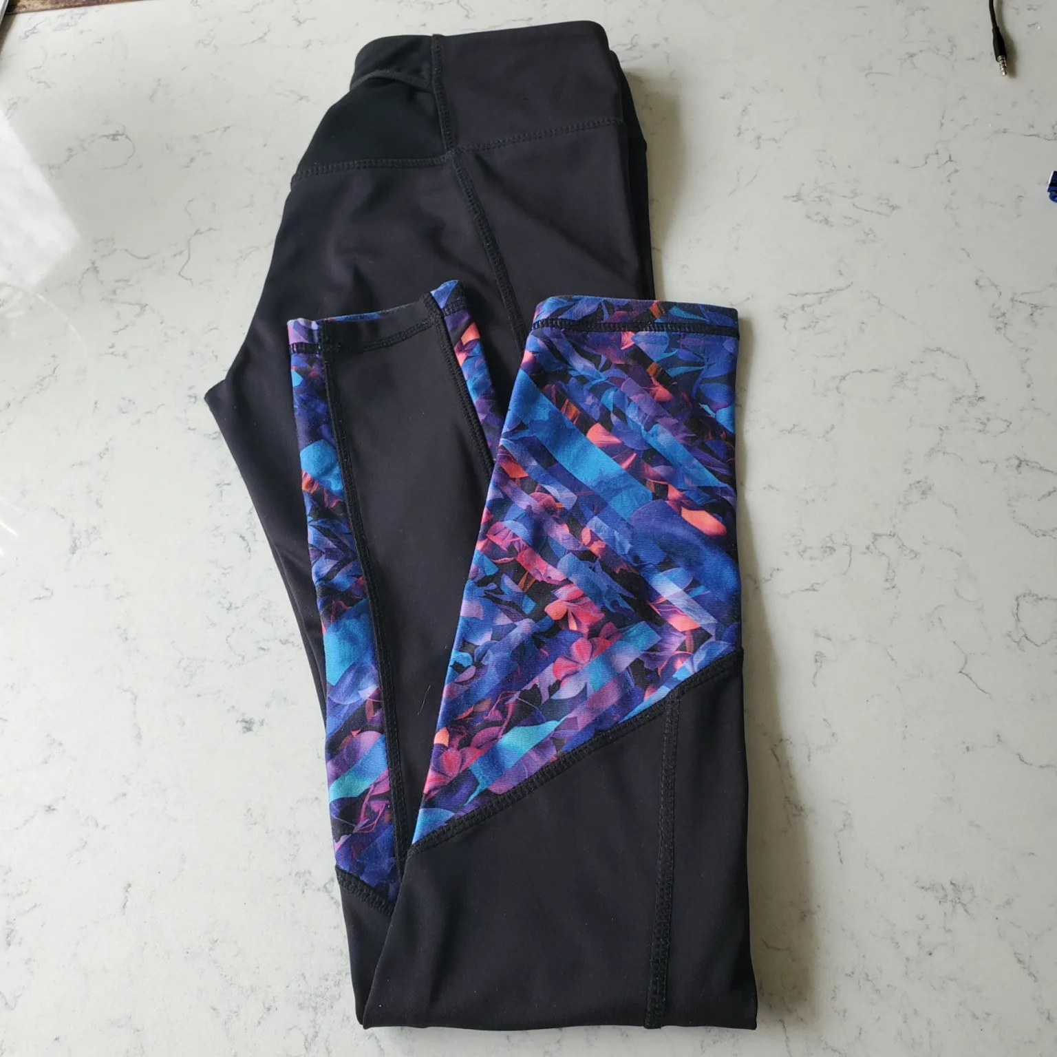 Image for Black leggings with a floral pattern at the bottom