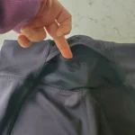 Thumbnail for Black leggings with a floral pattern at the bottom