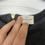 Thumbnail for Chandail Sézane taille S gris à paillettes doré et empiècements