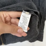 Thumbnail for Chandail Sézane taille S gris à paillettes doré et empiècements