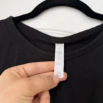 Thumbnail for Haut Alo Yoga taille S noir noué sur le devant