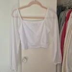 Featured thumbnail for Chandail blanc Small Ambiance