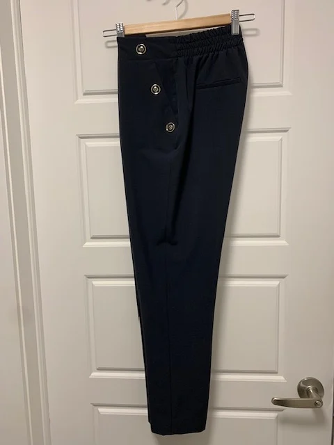 Featured image for Trousers with buttons