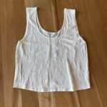 Featured thumbnail for Short white camisole with a leaf pattern