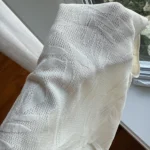 Thumbnail for Short white camisole with a leaf pattern