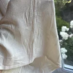Thumbnail for Short white camisole with a leaf pattern