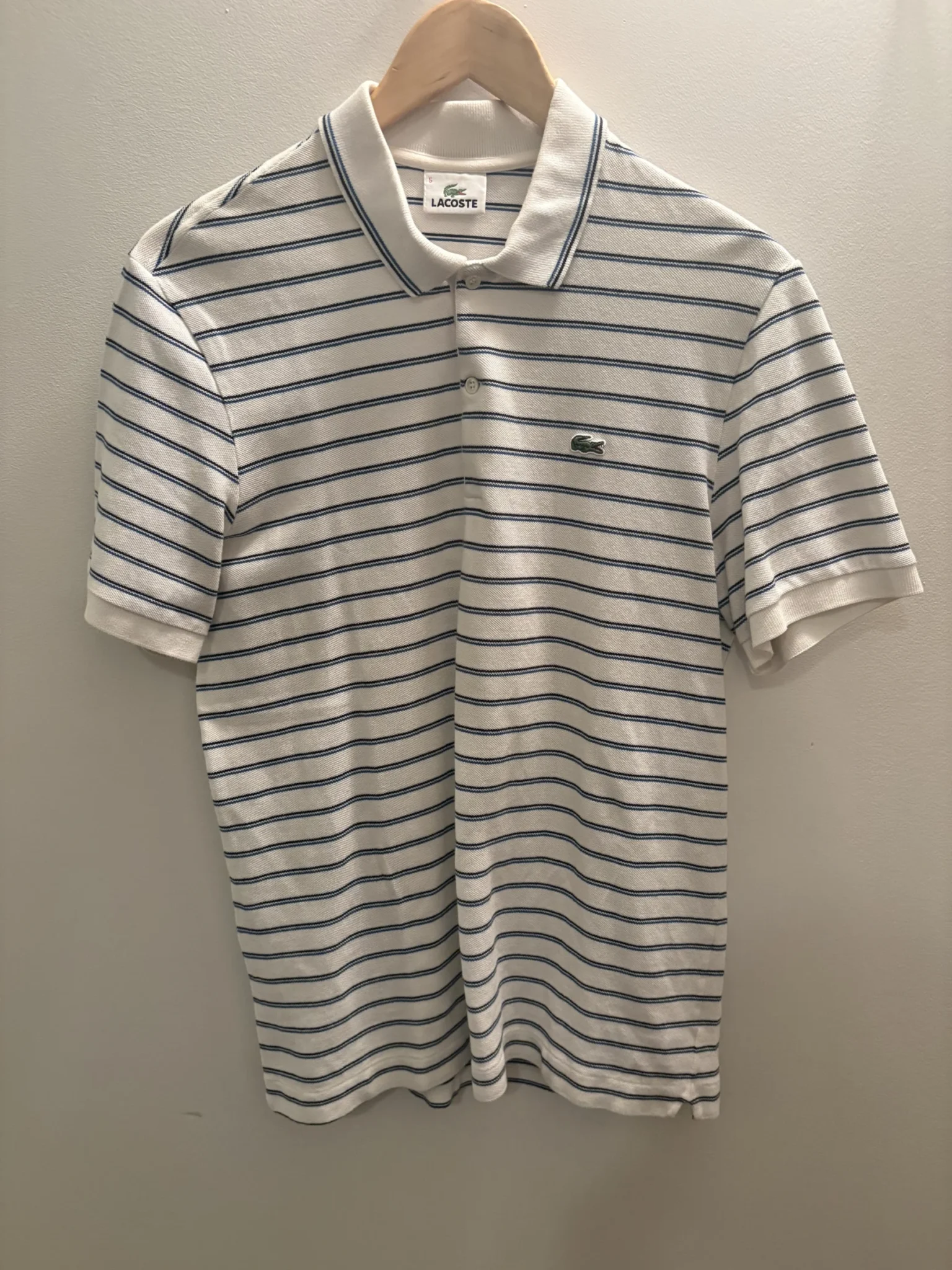 Featured image for Polo Lacoste rayé M