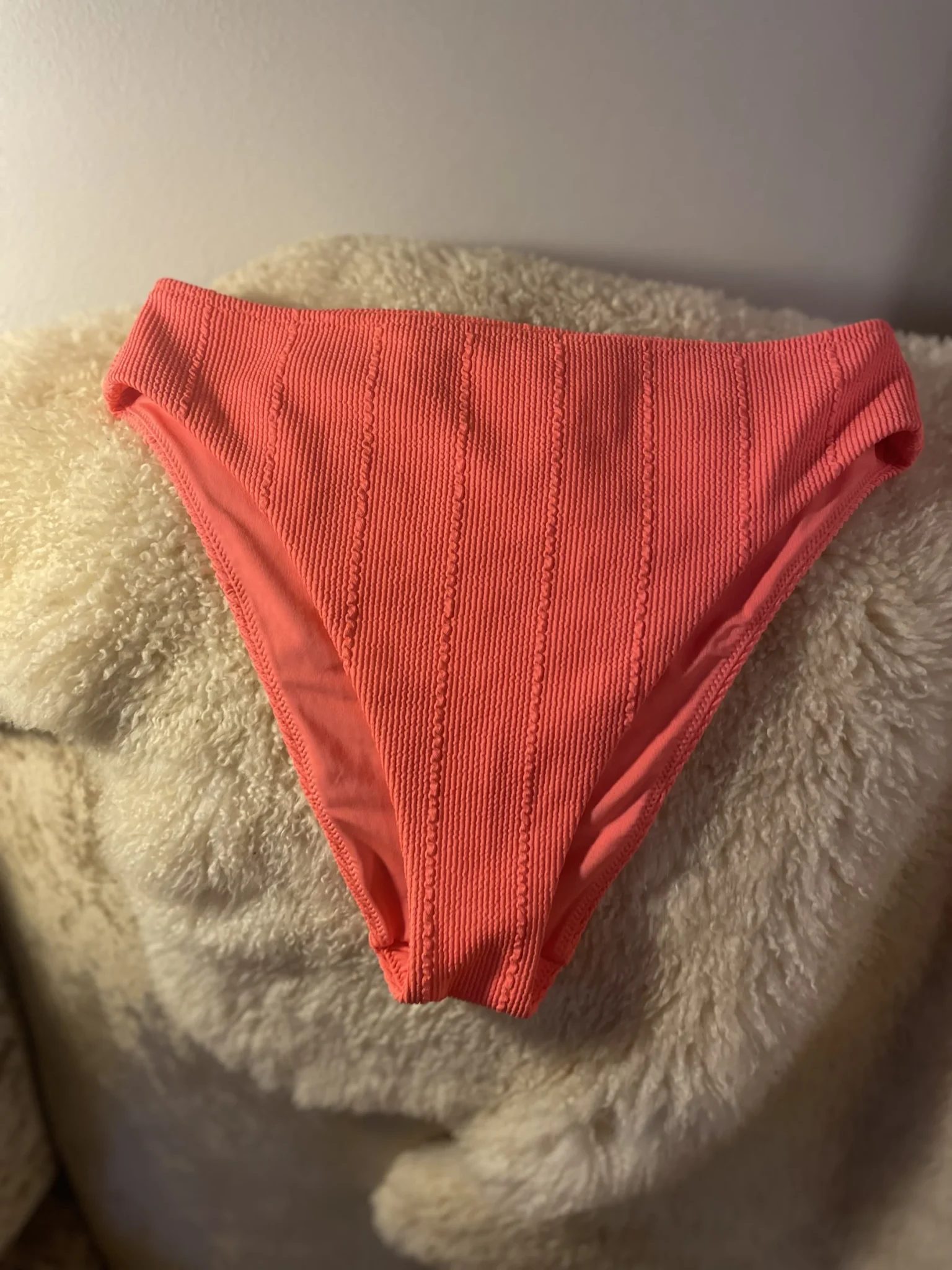 Featured image for Neon orange leotard bottoms