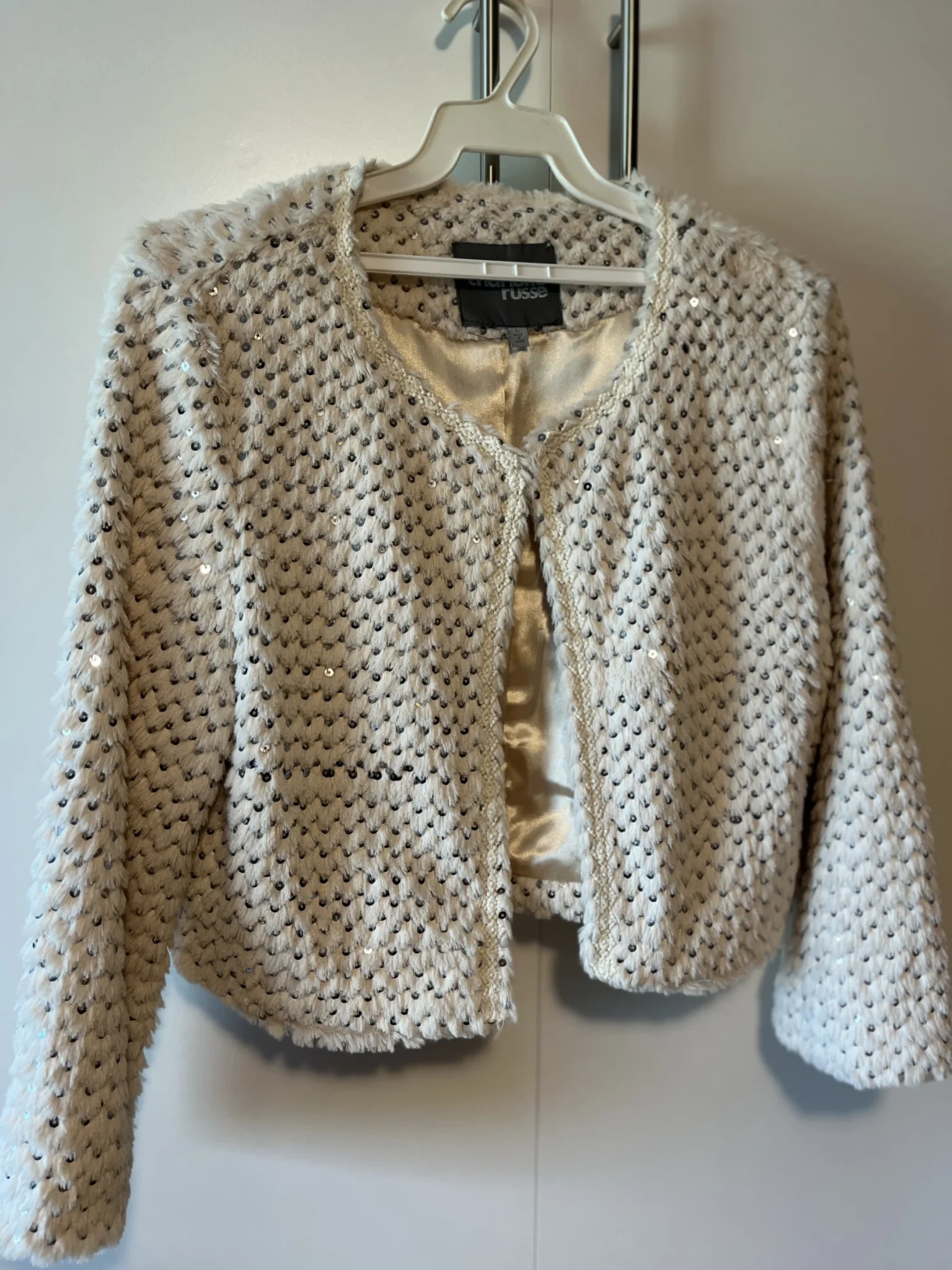 Featured image for Veston court blanc-crème à paillettes - Charlotte russe