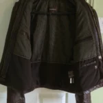 Thumbnail for Manteau en cuir brun avec col mouton détachable.