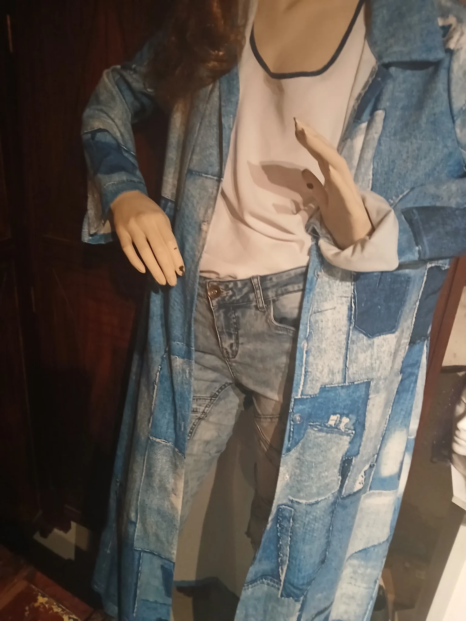 Featured image for Long coat made from pieces of denim