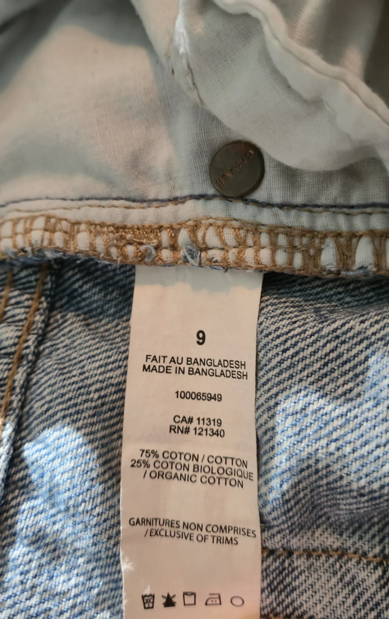 Image for Jeans Garage style vintage avec trou et délavé.