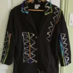 Featured thumbnail for Veste 3/4 Parsley et sage, noir avec des motifs de laines.