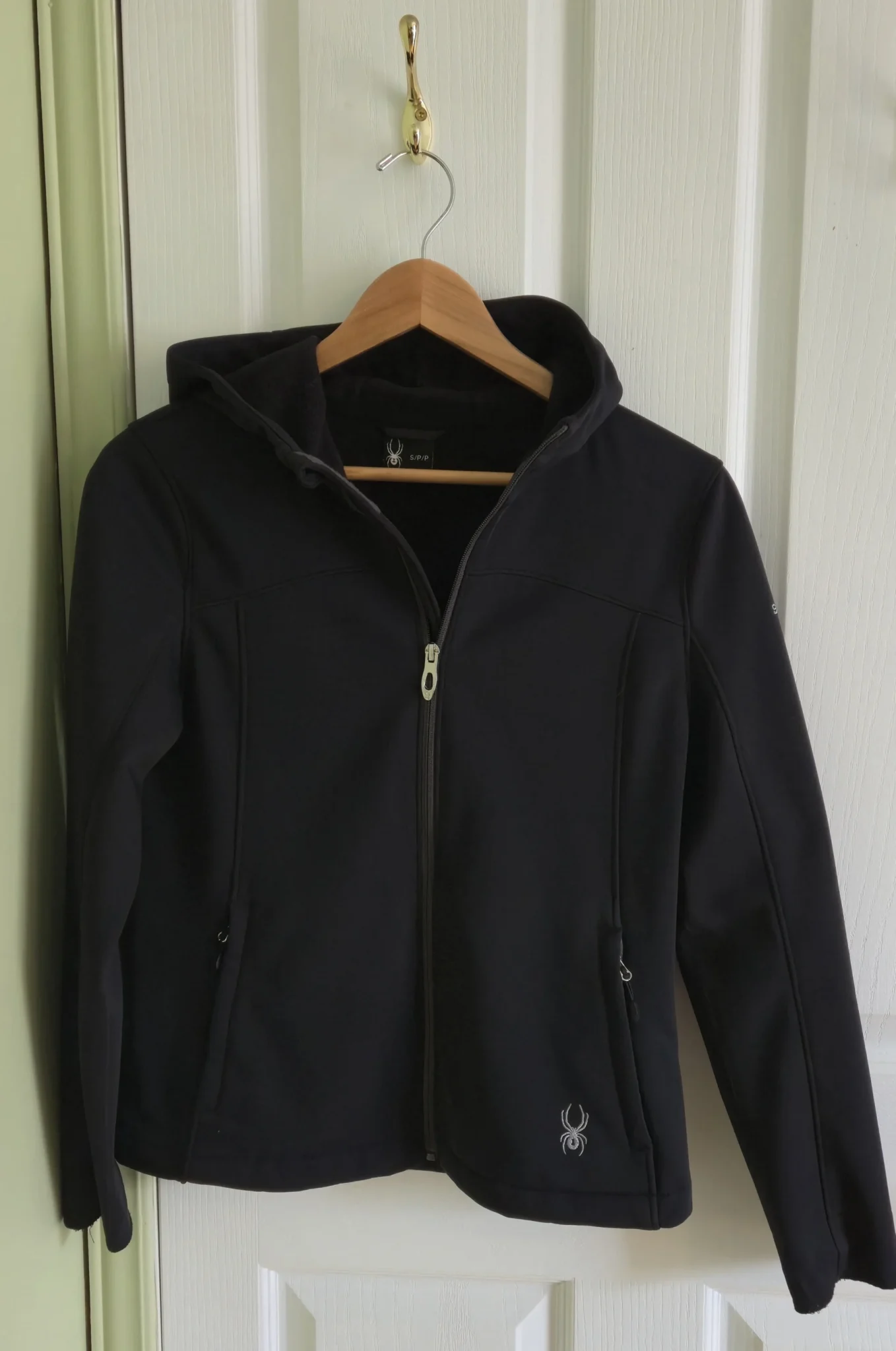 Featured image for Petit manteau nour en  nylon doublé en polar, marque Spyder.