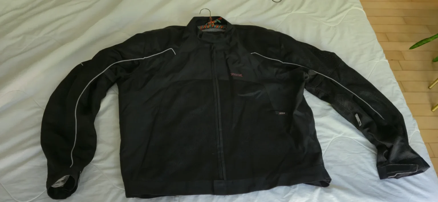 Featured image for Unisex black motorbike jacket, size 2XL, by Vega.