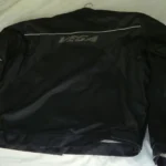 Thumbnail for Unisex black motorbike jacket, size 2XL, by Vega.