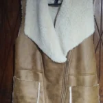 Featured thumbnail for Sleeveless coat