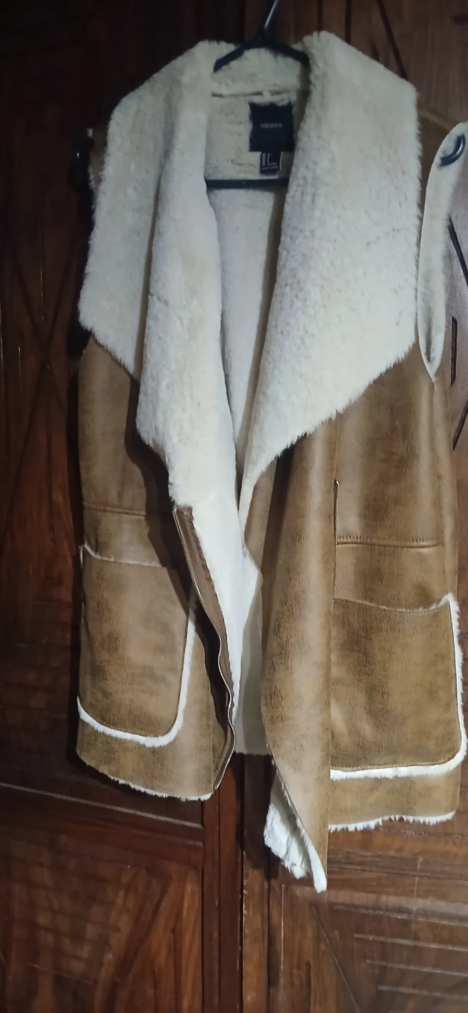 Image for Sleeveless coat