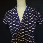 Featured thumbnail for Midi dress with a button-up collar