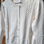 Featured thumbnail for Cream-coloured cardigan