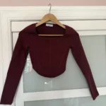 Featured thumbnail for Aritzia – Long-sleeved knitted bustier