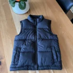 Featured thumbnail for Black sleeveless jacket