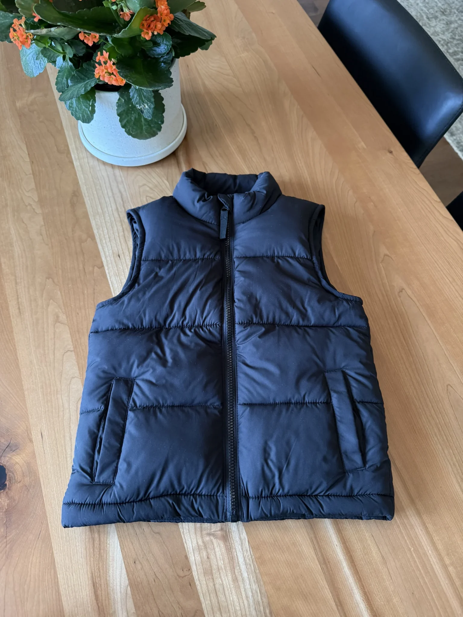 Featured image for Black sleeveless jacket