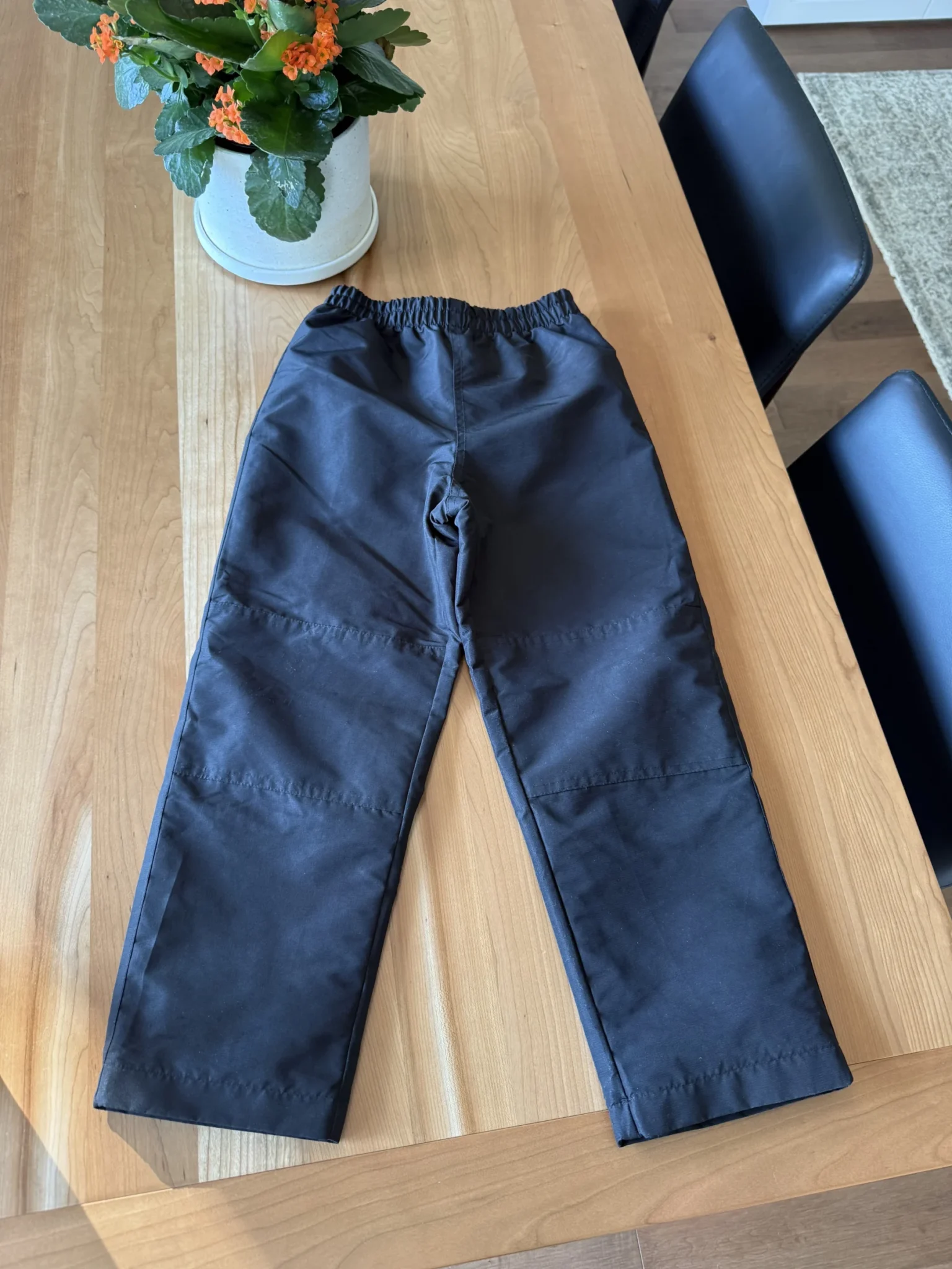Featured image for Black mid-season trousers with a jersey lining