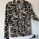 Featured thumbnail for Animal-print blouse