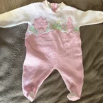 Featured thumbnail for Crackerjack vintage pink and white knitted romper – 6 months