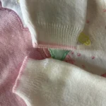 Thumbnail for Crackerjack vintage pink and white knitted romper – 6 months