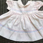 Featured thumbnail for Vintage TLC dress in pink corduroy with a crossover neckline, size 18M