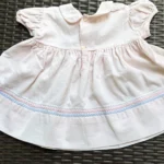 Thumbnail for Vintage TLC dress in pink corduroy with a crossover neckline, size 18M
