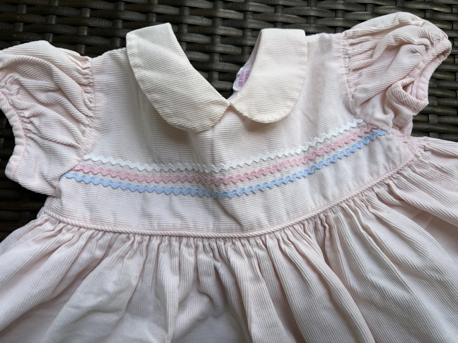 Image for Vintage TLC dress in pink corduroy with a crossover neckline, size 18M