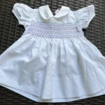 Featured thumbnail for Handmade vintage smocked dress ‘Tic Toc’ – Size 18 months (1½ years)