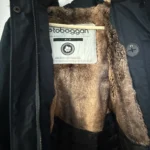 Thumbnail for navy blue coat with a fur-trimmed hood